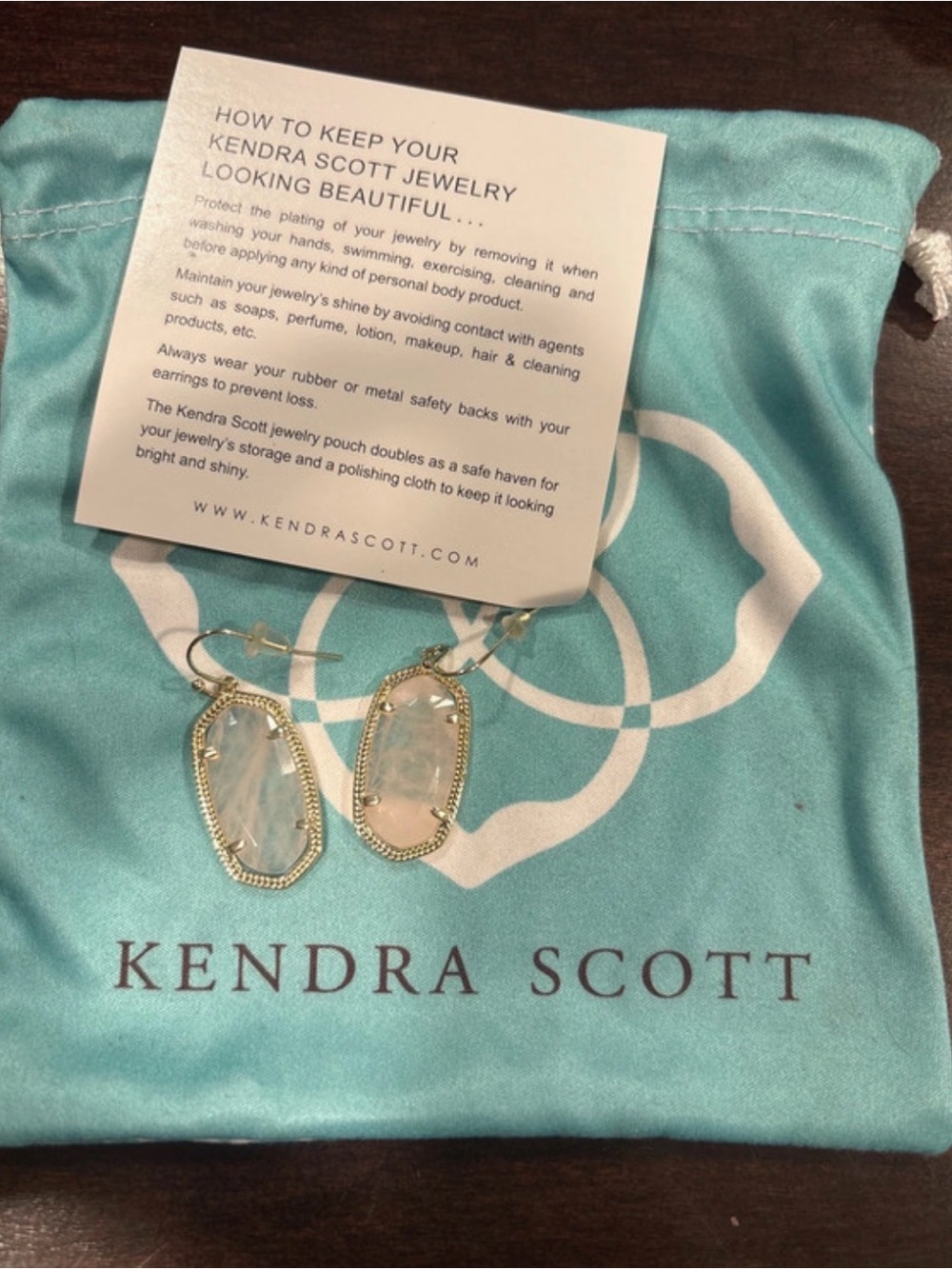 Kendra Scott Gold Drop Earrings with White Opal Stones